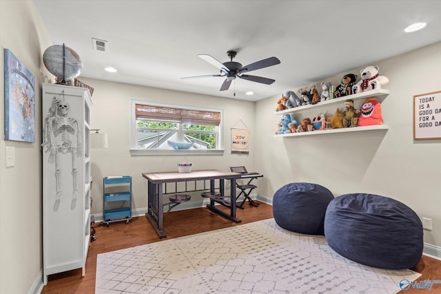 interior space with hardwood / wood-style floors and ceiling fan