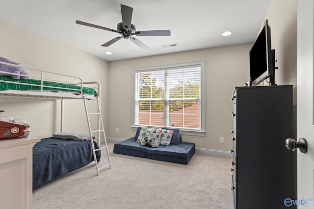 carpeted bedroom featuring ceiling fan