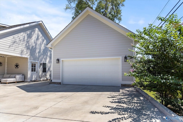 view of property exterior with a garage