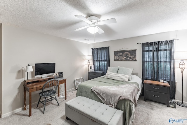 43 Terry Ln, Trinity, AL 35673 - bedroom with light carpet, baseboards, a textured ceiling, and ceiling fan