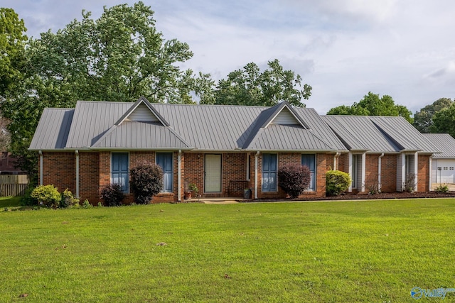 43 Terry Ln, Trinity, AL 35673 - view of front of property featuring a front yard and brick siding