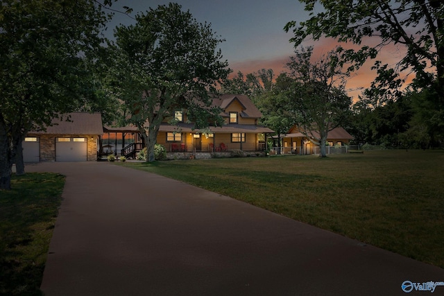 420 County Road 496, Centre, AL 35960 - view of front of home with a porch, driveway, a yard, and stone siding