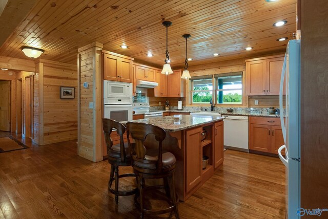 420 County Road 496, Centre, AL 35960 - kitchen with wood ceiling, a kitchen island, wood finished floors, and white appliances