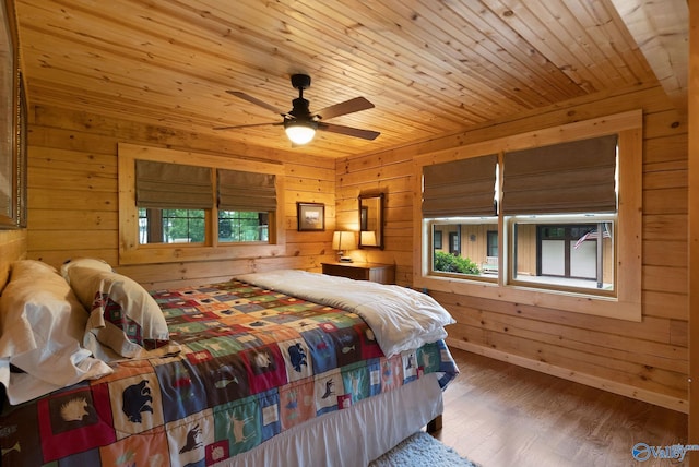 420 County Road 496, Centre, AL 35960 - bedroom featuring wood walls, wood finished floors, and wooden ceiling