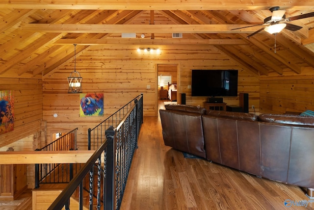 420 County Road 496, Centre, AL 35960 - living area featuring wood ceiling, ceiling fan, visible vents, wooden walls, and vaulted ceiling with beams