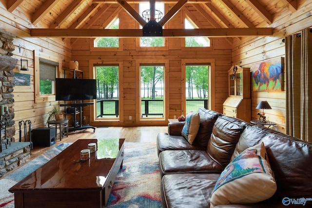 420 County Road 496, Centre, AL 35960 - living area featuring wood ceiling, beam ceiling, wooden walls, and wood finished floors