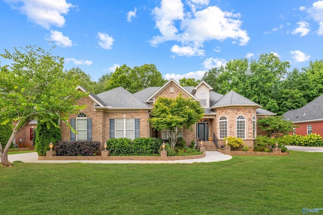 230 Knotting Pl, Madison, AL 35758 - traditional-style home featuring brick siding and a front yard