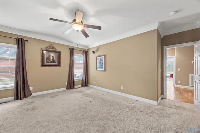 230 Knotting Pl, Madison, AL 35758 - empty room featuring light colored carpet, ceiling fan, crown molding, and a smoke detector