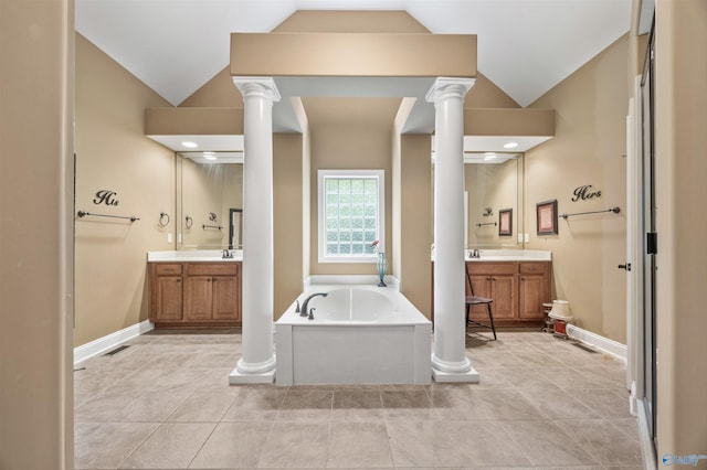 230 Knotting Pl, Madison, AL 35758 - bathroom with vaulted ceiling, decorative columns, a bath, and two vanities