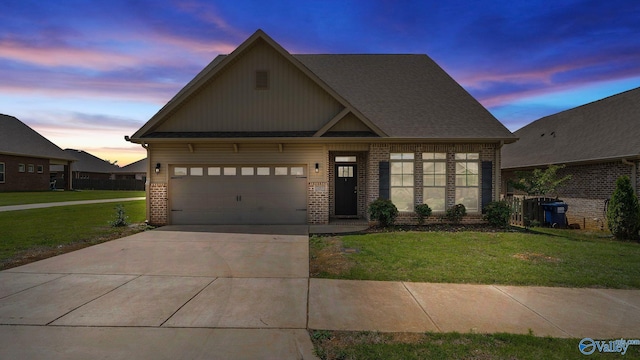 28622 Paseo Rd, Madison, AL 35756 - craftsman-style home with brick siding, a yard, and driveway