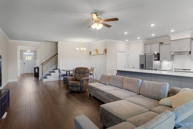 28622 Paseo Rd, Madison, AL 35756 - living area with a chandelier, ceiling fan, stairway, dark wood-type flooring, and recessed lighting
