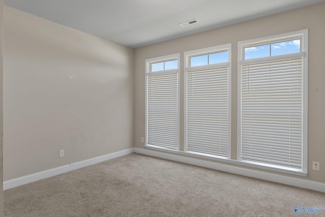 28622 Paseo Rd, Madison, AL 35756 - unfurnished room featuring carpet flooring and baseboards