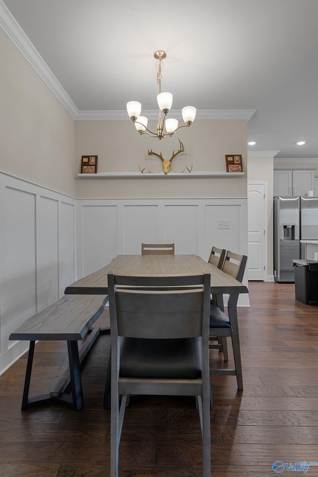 28622 Paseo Rd, Madison, AL 35756 - dining space with a decorative wall, ornamental molding, a chandelier, recessed lighting, and a wainscoted wall