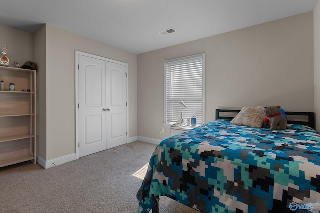 28622 Paseo Rd, Madison, AL 35756 - bedroom featuring carpet flooring, baseboards, and a closet