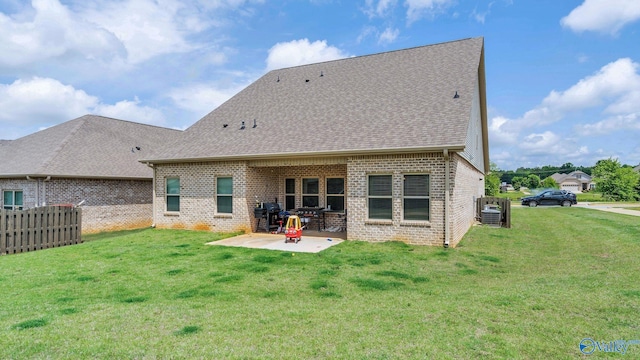 28622 Paseo Rd, Madison, AL 35756 - rear view of property with a patio area, brick siding, roof with shingles, and cooling unit