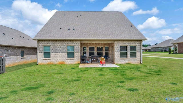 28622 Paseo Rd, Madison, AL 35756 - rear view of property with a patio, brick siding, a lawn, and a shingled roof
