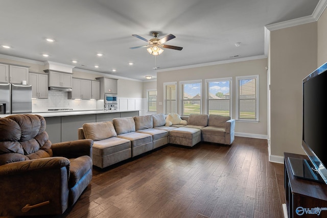 28622 Paseo Rd, Madison, AL 35756 - living room featuring ceiling fan, dark wood-style flooring, ornamental molding, baseboards, and recessed lighting