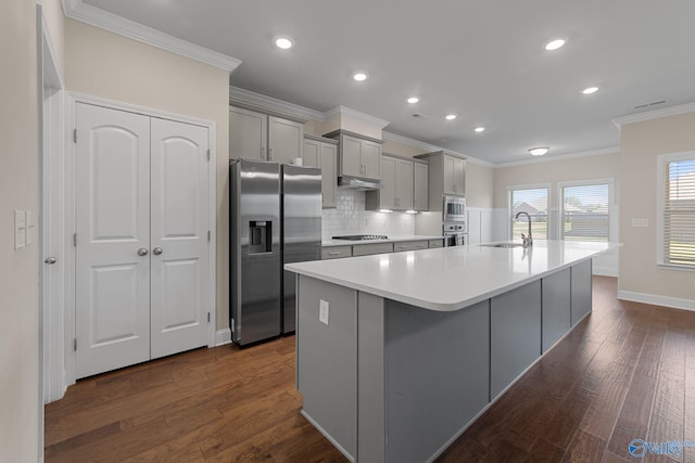 28622 Paseo Rd, Madison, AL 35756 - kitchen with stainless steel appliances, gray cabinetry, a sink, ornamental molding, and a large island with sink