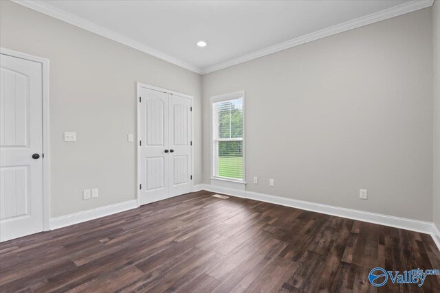 545 Pan Creek Rd, Baileyton, AL 35019 - unfurnished bedroom featuring dark wood-style flooring, crown molding, and baseboards