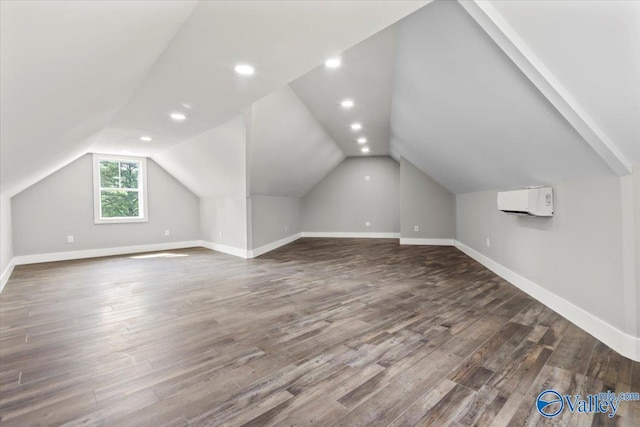 545 Pan Creek Rd, Baileyton, AL 35019 - additional living space with recessed lighting, lofted ceiling, baseboards, an AC wall unit, and wood finished floors