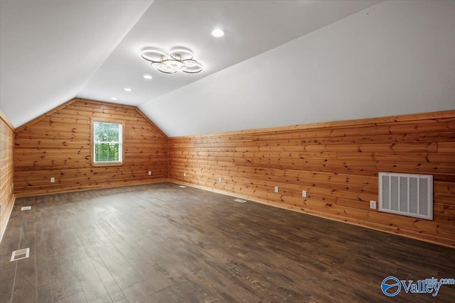 545 Pan Creek Rd, Baileyton, AL 35019 - additional living space featuring wooden walls, lofted ceiling, visible vents, and hardwood / wood-style flooring