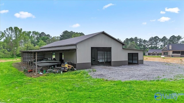 545 Pan Creek Rd, Baileyton, AL 35019 - back of property featuring a pole building, a yard, an outbuilding, and a garage