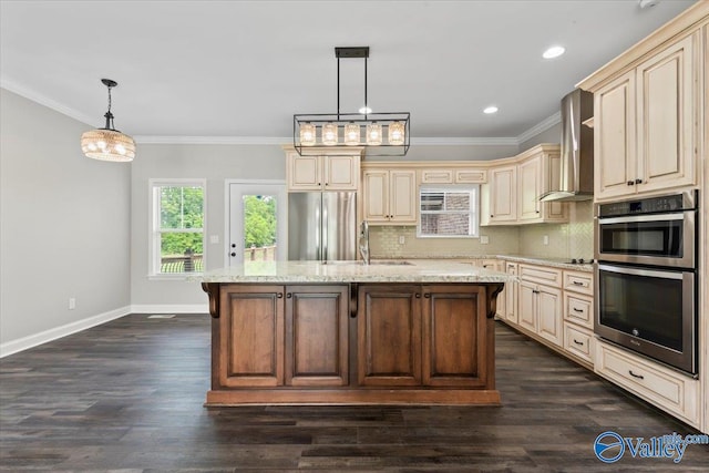 545 Pan Creek Rd, Baileyton, AL 35019 - kitchen featuring appliances with stainless steel finishes, wall chimney range hood, cream cabinets, and baseboards