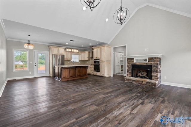 545 Pan Creek Rd, Baileyton, AL 35019 - unfurnished living room featuring a sink, baseboards, and dark wood-type flooring