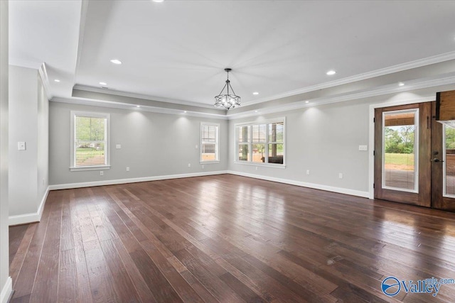 545 Pan Creek Rd, Baileyton, AL 35019 - unfurnished living room with dark wood-style flooring, ornamental molding, a notable chandelier, and baseboards