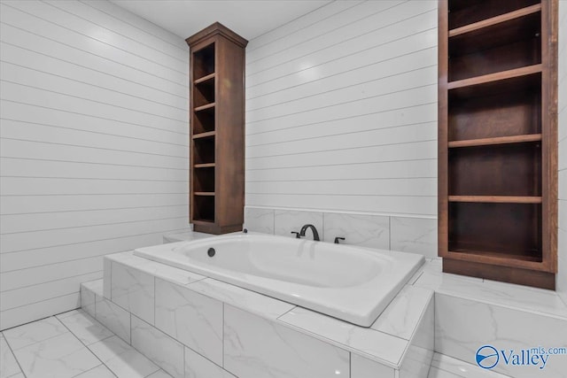 545 Pan Creek Rd, Baileyton, AL 35019 - bathroom with wood walls, a bath, and marble finish floor