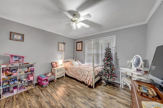 bedroom with hardwood / wood-style floors, ceiling fan, and ornamental molding