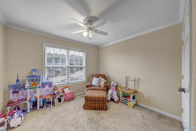 rec room featuring carpet floors, ceiling fan, and ornamental molding