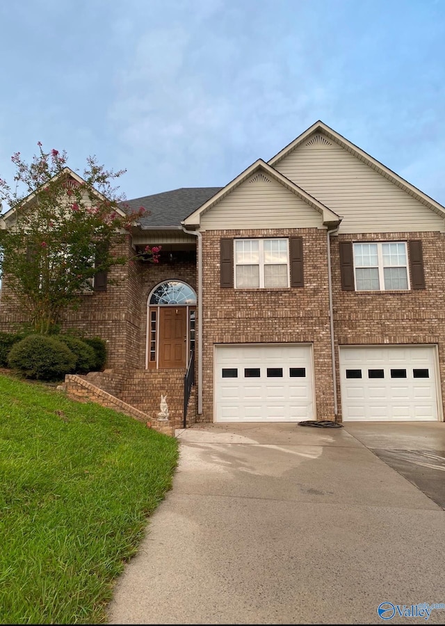 view of front of property with a garage