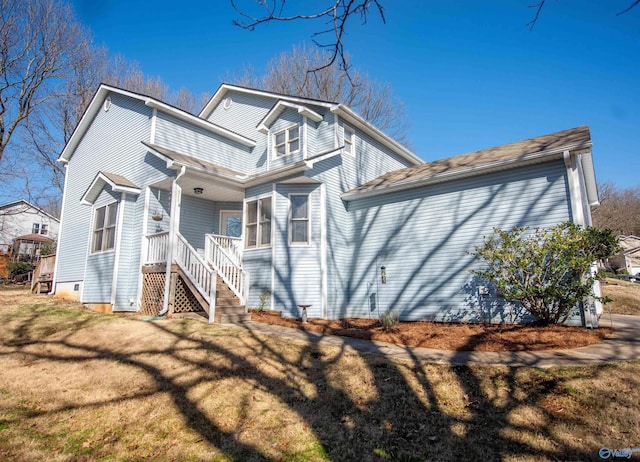 exterior space with a porch and a yard