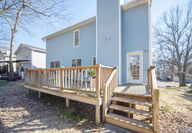 rear view of house with a deck