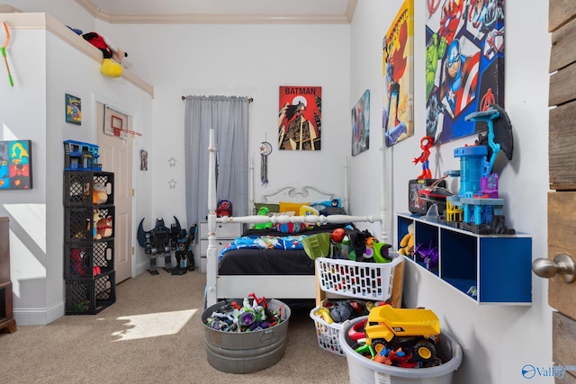 carpeted bedroom featuring crown molding and baseboards