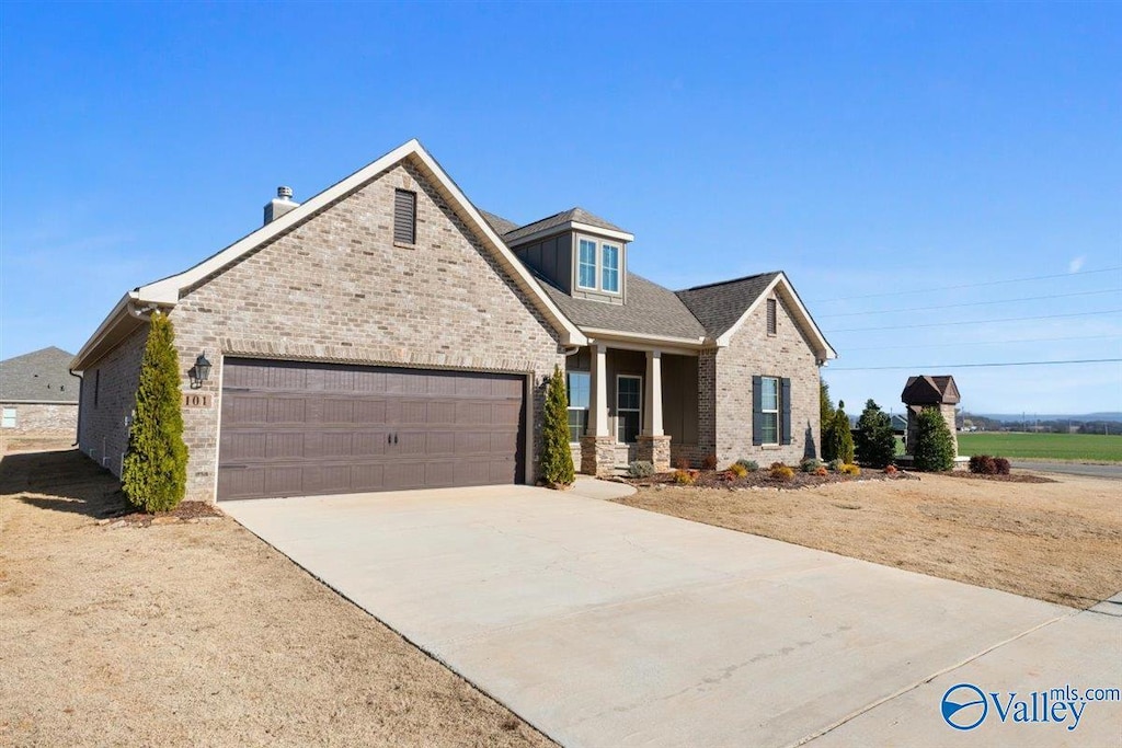 view of front of home with a garage