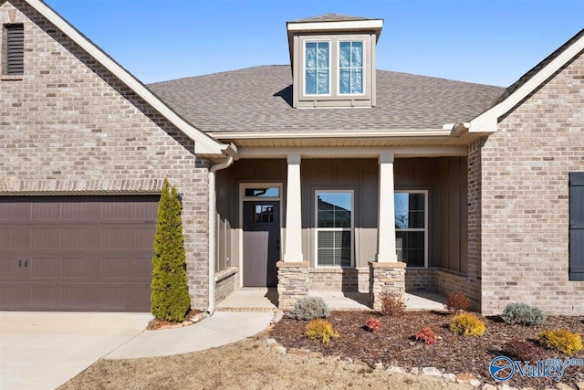 property entrance with covered porch and a garage