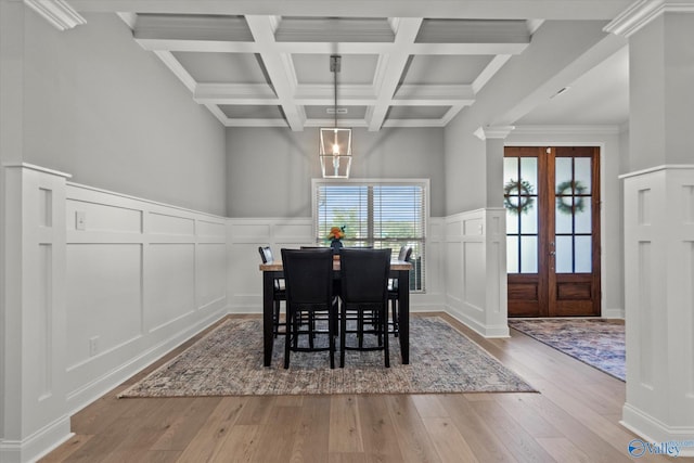 9045 Redstone Square Dr, Huntsville, AL 35824 - dining area featuring a decorative wall, hardwood / wood-style floors, beamed ceiling, coffered ceiling, and ornate columns