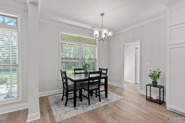 9045 Redstone Square Dr, Huntsville, AL 35824 - dining room featuring a chandelier, light wood-style floors, and crown molding