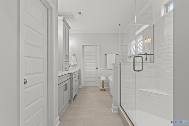 9045 Redstone Square Dr, Huntsville, AL 35824 - bathroom featuring ornamental molding, vanity, a stall shower, and a freestanding bath