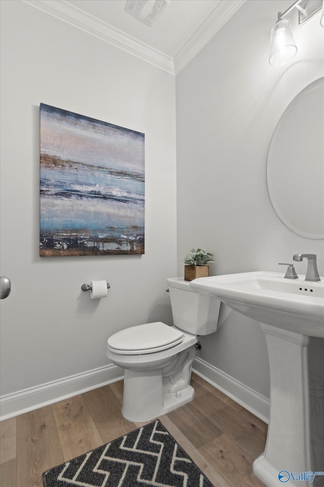 9045 Redstone Square Dr, Huntsville, AL 35824 - half bathroom with crown molding and wood finished floors