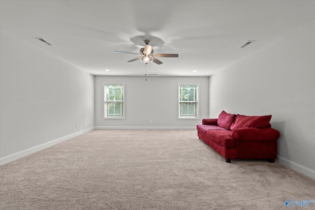 9045 Redstone Square Dr, Huntsville, AL 35824 - living area featuring ceiling fan and carpet