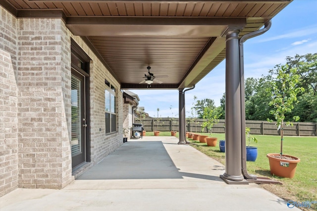 9045 Redstone Square Dr, Huntsville, AL 35824 - fenced backyard with grilling area, a patio, and ceiling fan