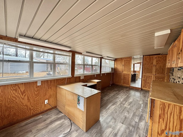 unfurnished sunroom featuring wooden ceiling