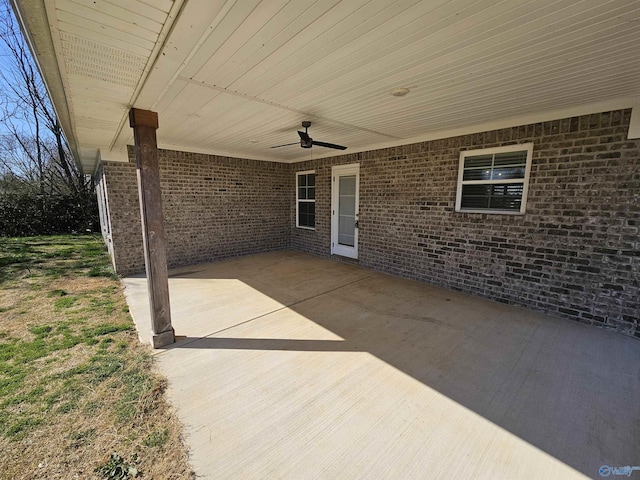 view of patio featuring ceiling fan