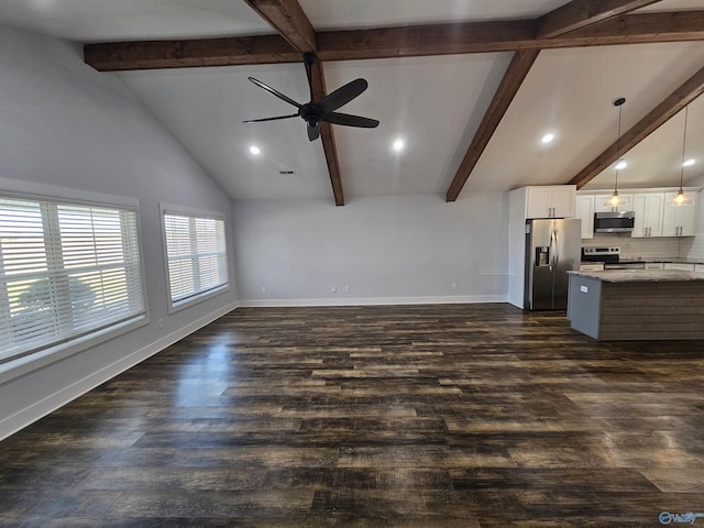 unfurnished living room featuring dark wood-style floors, a ceiling fan, lofted ceiling with beams, and baseboards