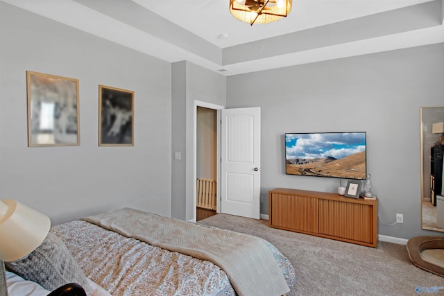 bedroom featuring baseboards and carpet flooring
