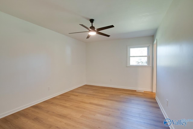 unfurnished room featuring ceiling fan and light hardwood / wood-style flooring