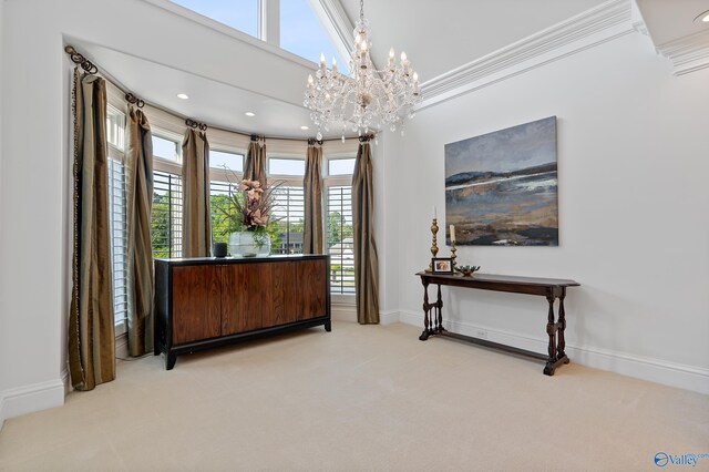 interior space with carpet, a chandelier, baseboards, crown molding, and recessed lighting